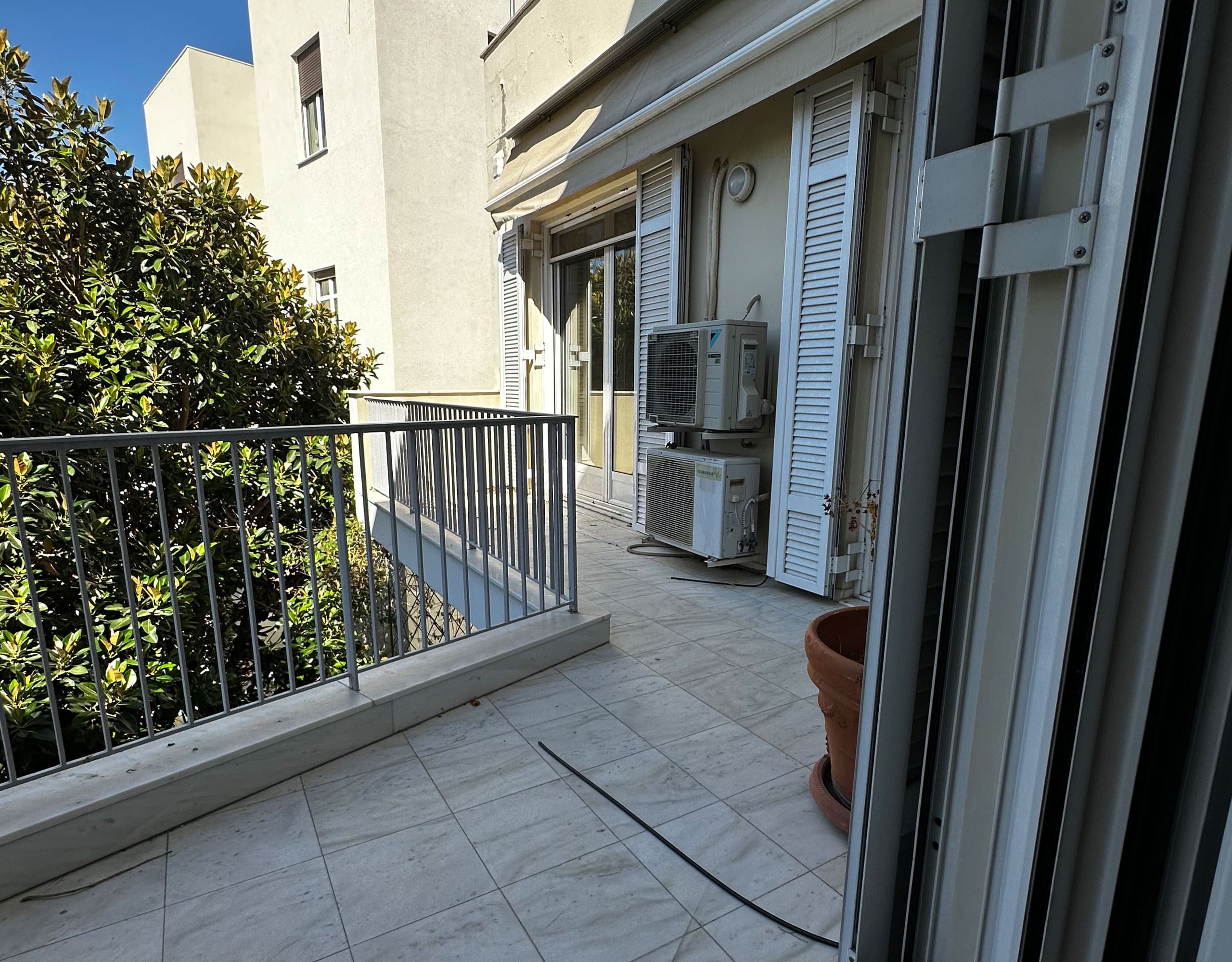 Balcony with tiled floor, railing, and exterior building view, Anaktora, Kolonaki, Athens, Greece