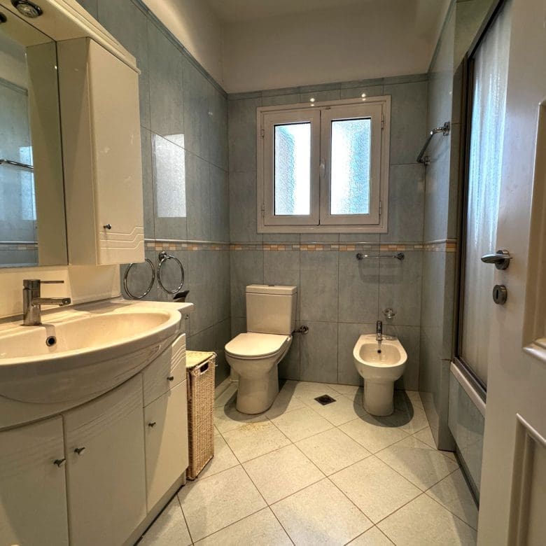 Bathroom with double vanity, toilet, bidet, and window, Anaktora, Kolonaki, Athens, Greece