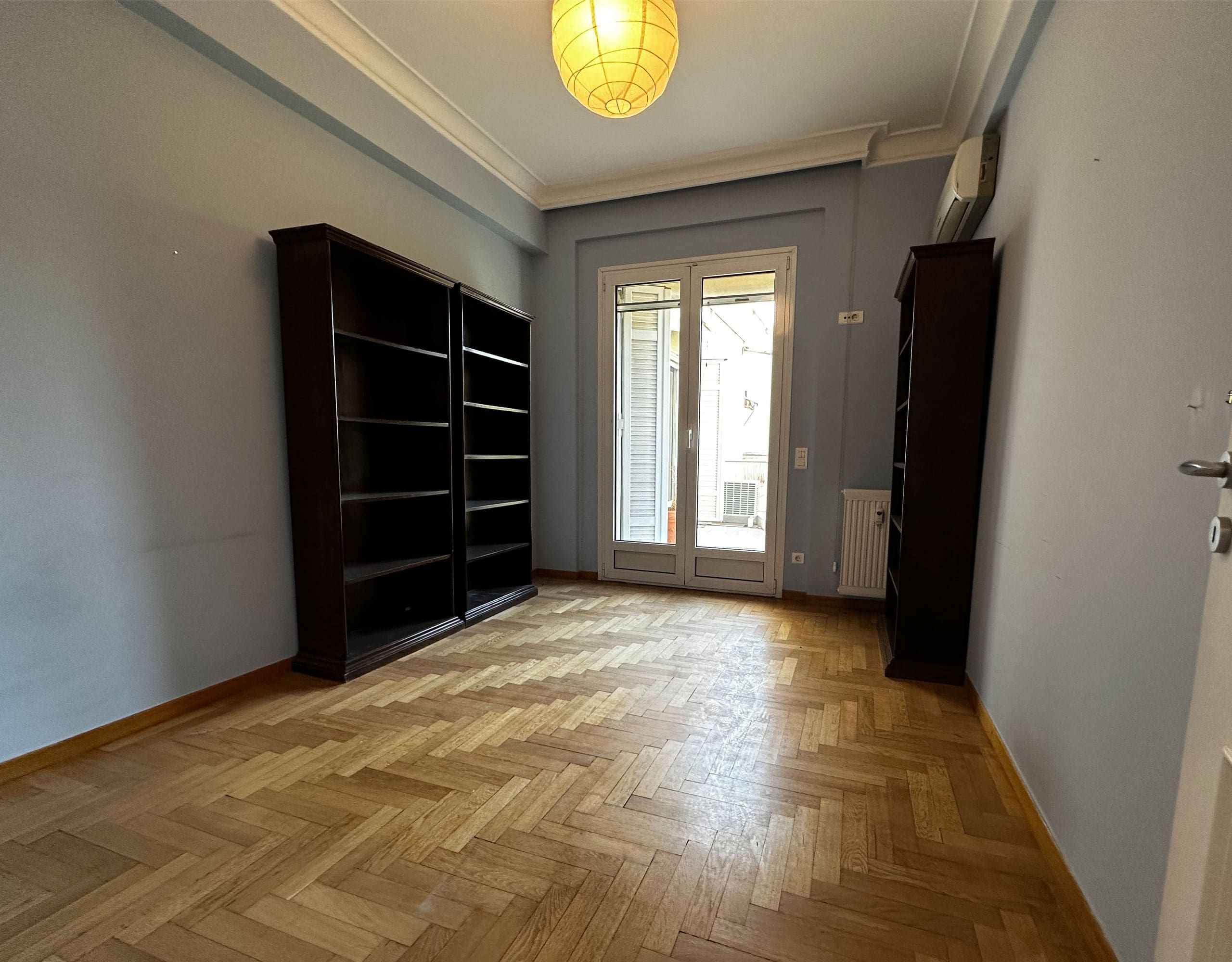 Bedroom with built-in wardrobes, wood flooring, and window, Anaktora, Kolonaki, Athens, Greece