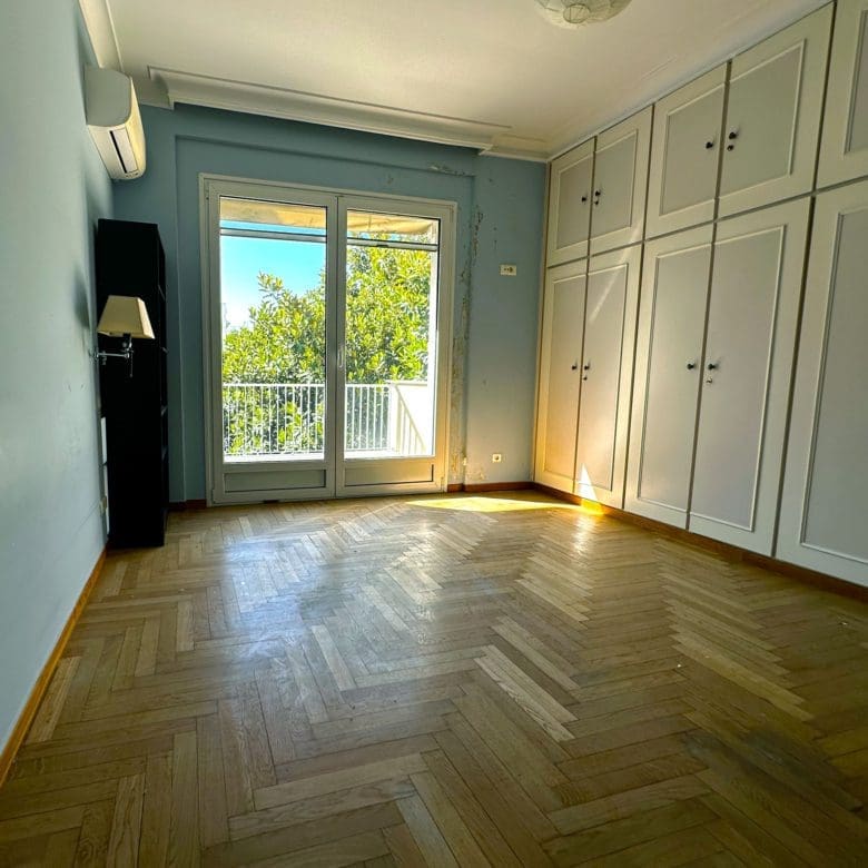Bedroom with wall-to-wall wardrobes and balcony doors, Anaktora, Kolonaki, Athens, Greece
