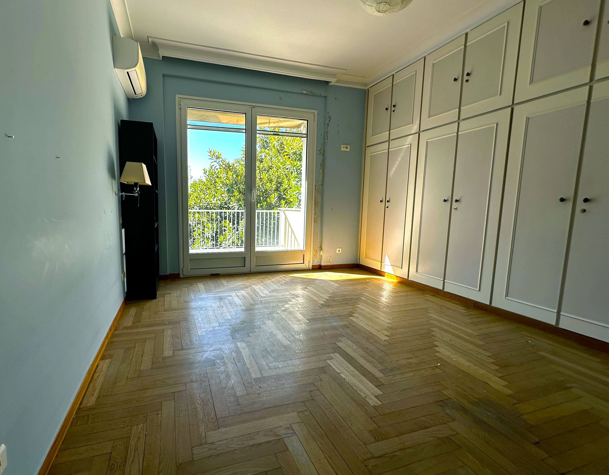 Bedroom with wall-to-wall wardrobes and balcony doors, Anaktora, Kolonaki, Athens, Greece