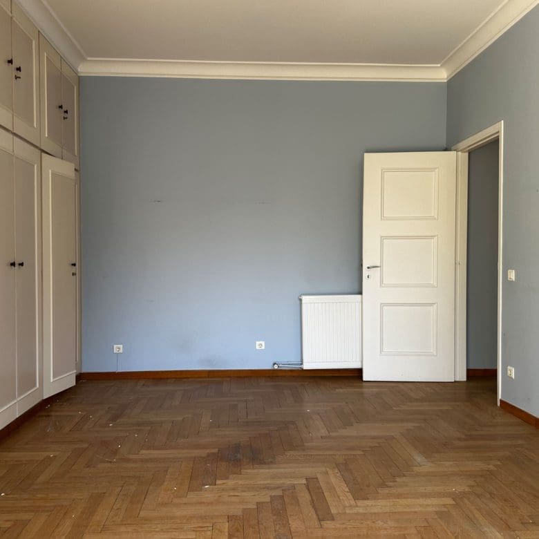 Empty bedroom with built-in wardrobes and wood flooring, Anaktora, Kolonaki, Athens, Greece
