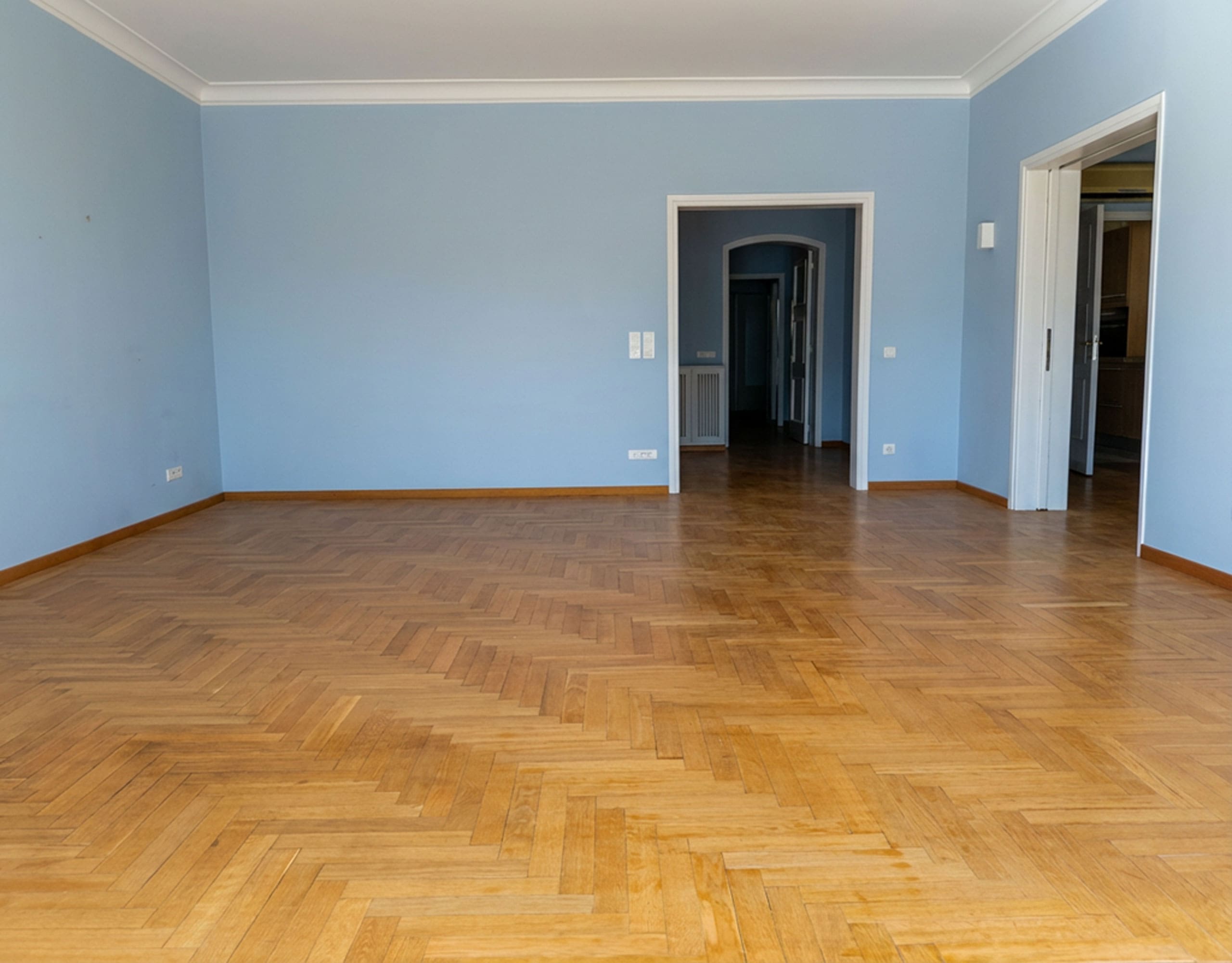 Empty room with wood flooring and doorway to adjacent spaces, Anaktora, Kolonaki, Athens, Greece