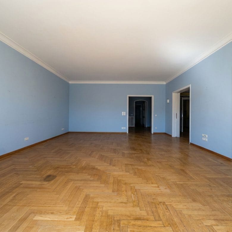 Large empty room with wood flooring and multiple doorways, Anaktora, Kolonaki, Athens, Greece