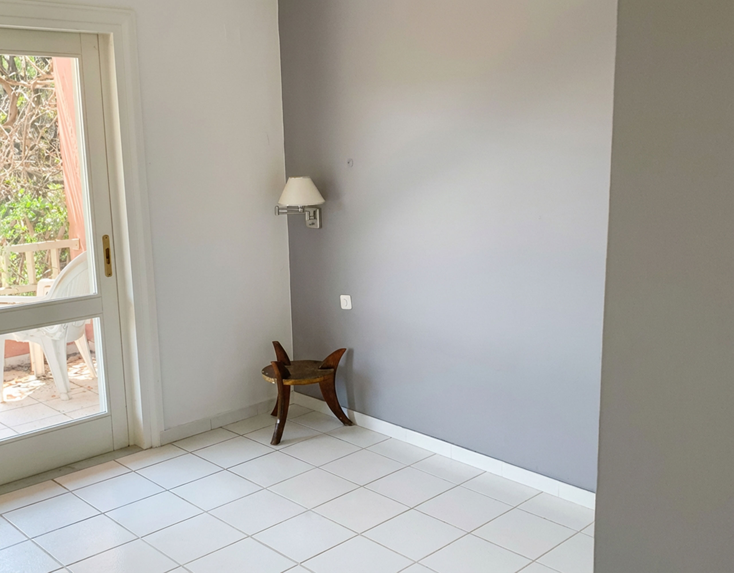 Guest room interior with veranda at hotel property in Limi, Evia