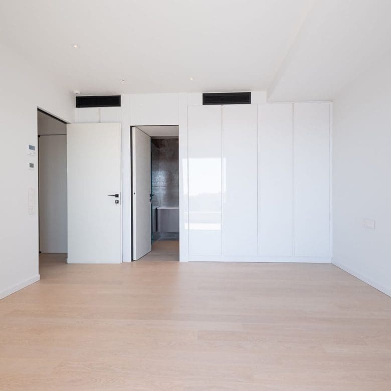 Bright open room with wood flooring and doorway to an inner hall, Athens Riviera, Greece