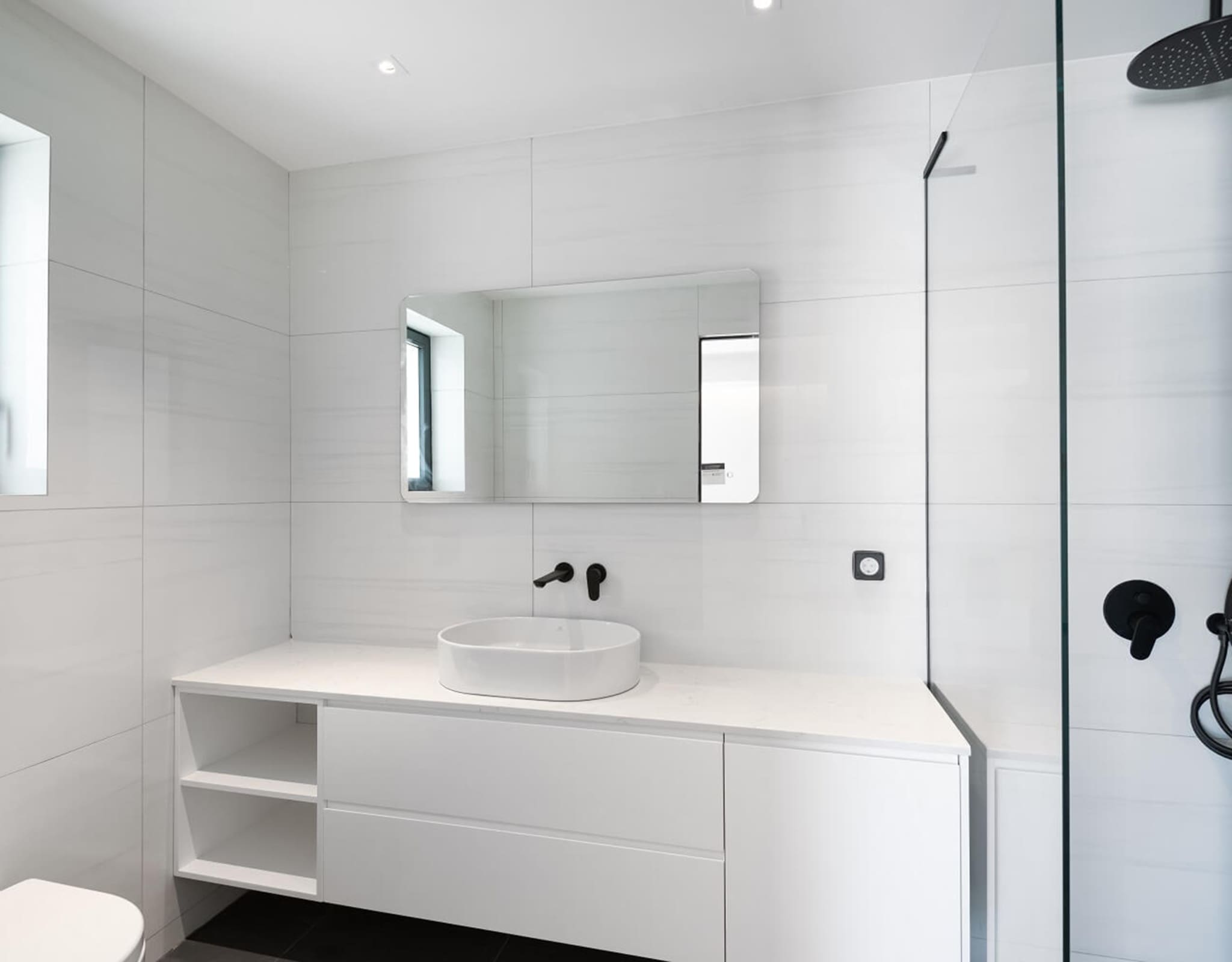 Minimal bathroom with white vanity, mirror, and walk-in shower, Athens Riviera, Greece