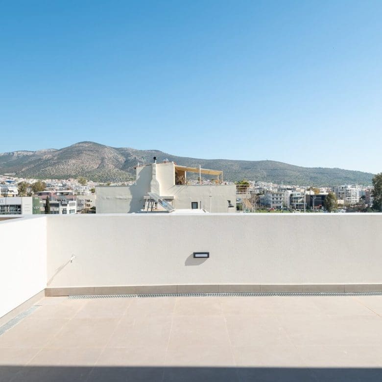 Spacious empty balcony terrace with open sky and mountain views, Athens Riviera, Greece