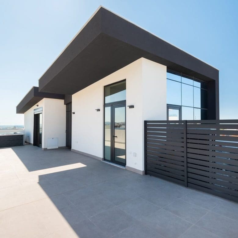 Modern rooftop structure with pergola-style roof and privacy screen, Athens Riviera, Greece