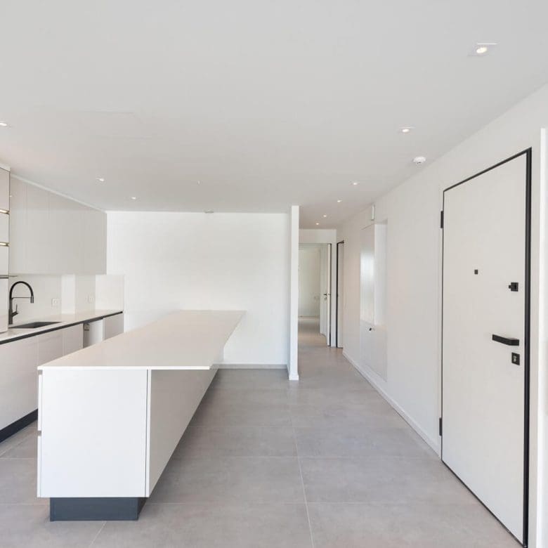 Minimal white kitchen with island and clean hallway lines, Athens Riviera, Greece
