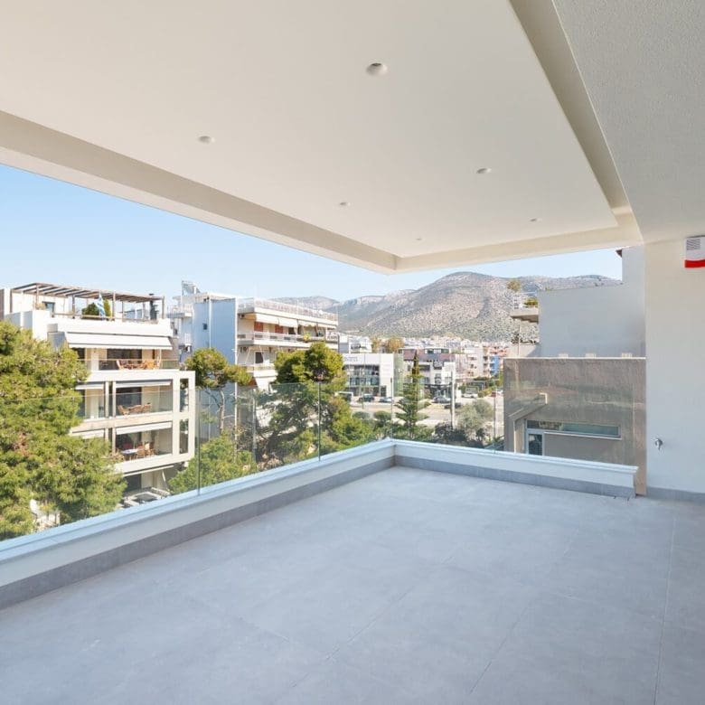 Covered balcony with wide opening and open views to the surrounding area, Athens Riviera, Greece