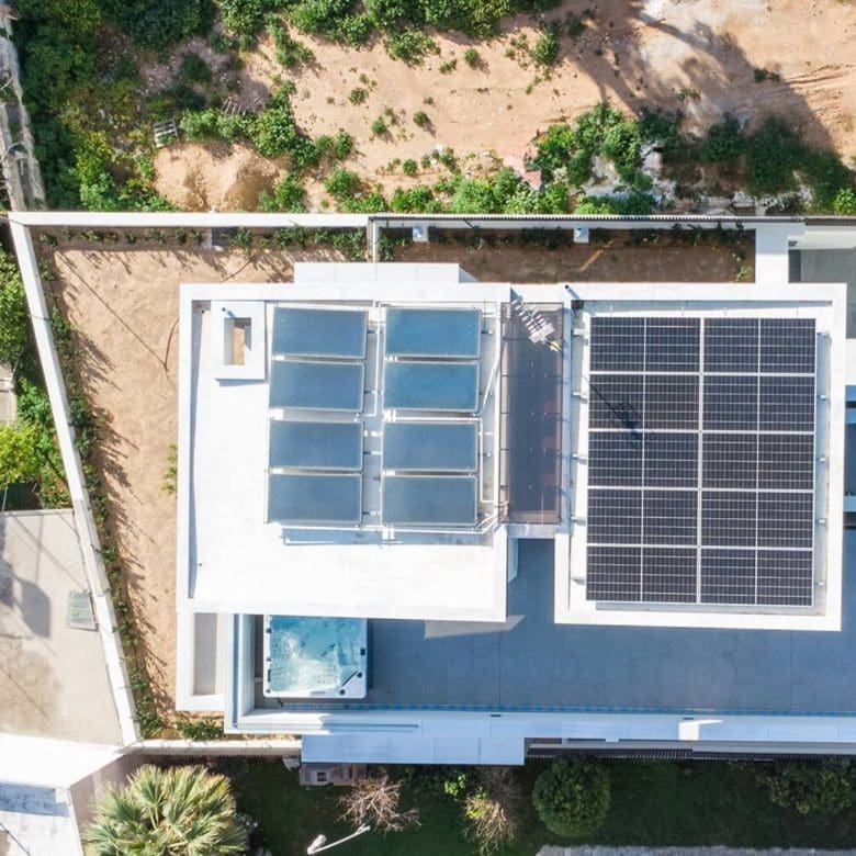 Top-down drone view of the rooftop with solar panels and terrace layout, Athens Riviera, Greece