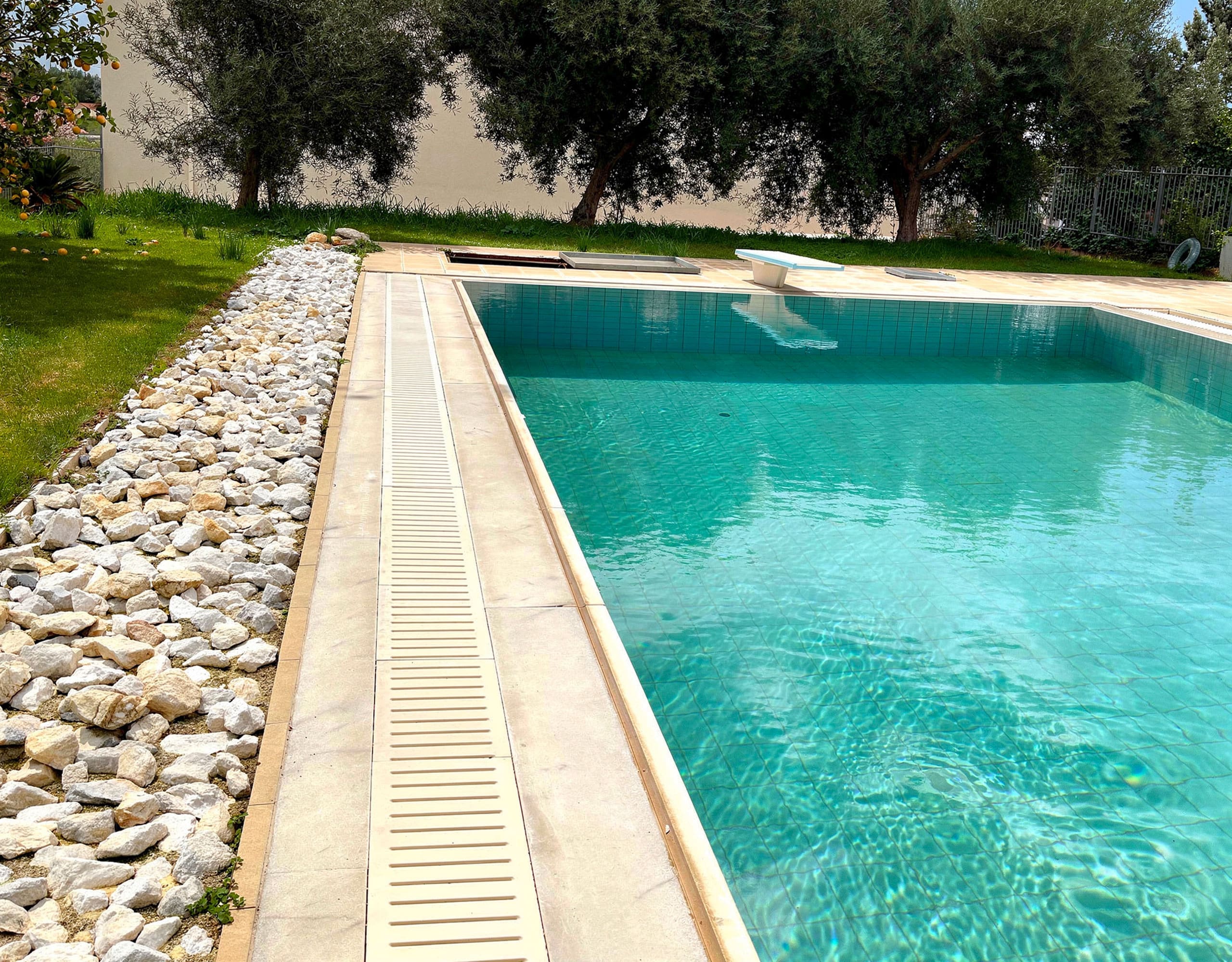 Pool Detail — Water and Edge Finish Pool edge and water detail at the private swimming pool in Eretria