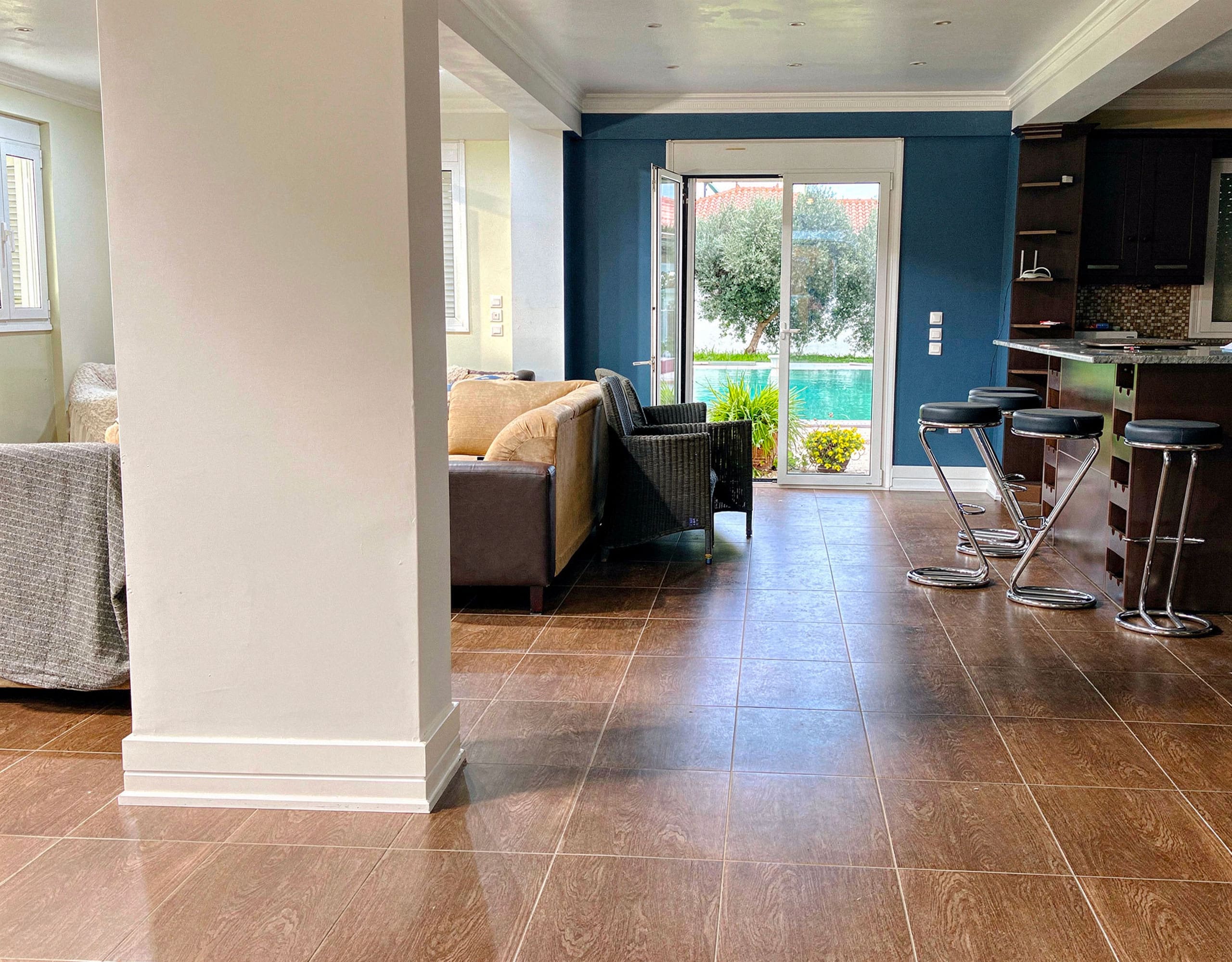 Open-Plan Living Area — Eretria Maisonette Open-plan living area with access to the garden at the Eretria maisonette