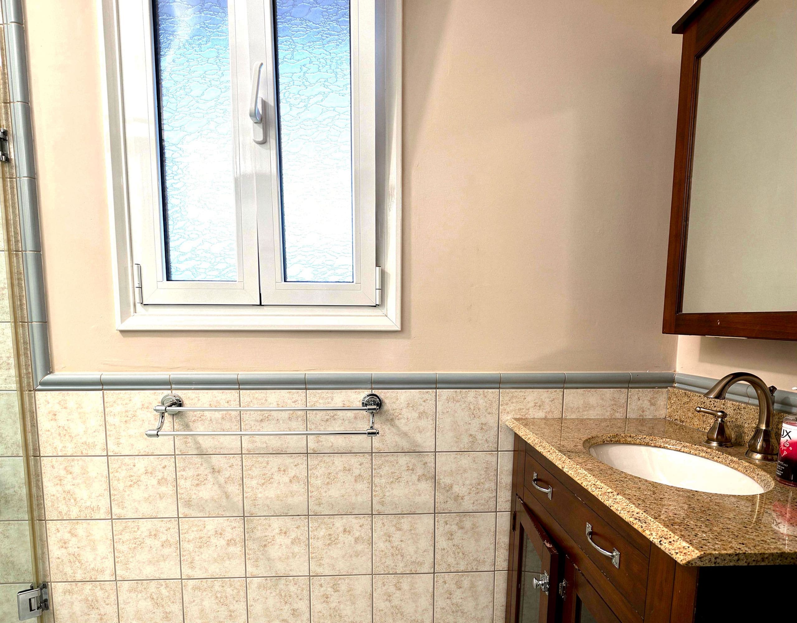 Bathroom Detail — Window and Tiling Bathroom window and tiled wall detail in the Eretria maisonette