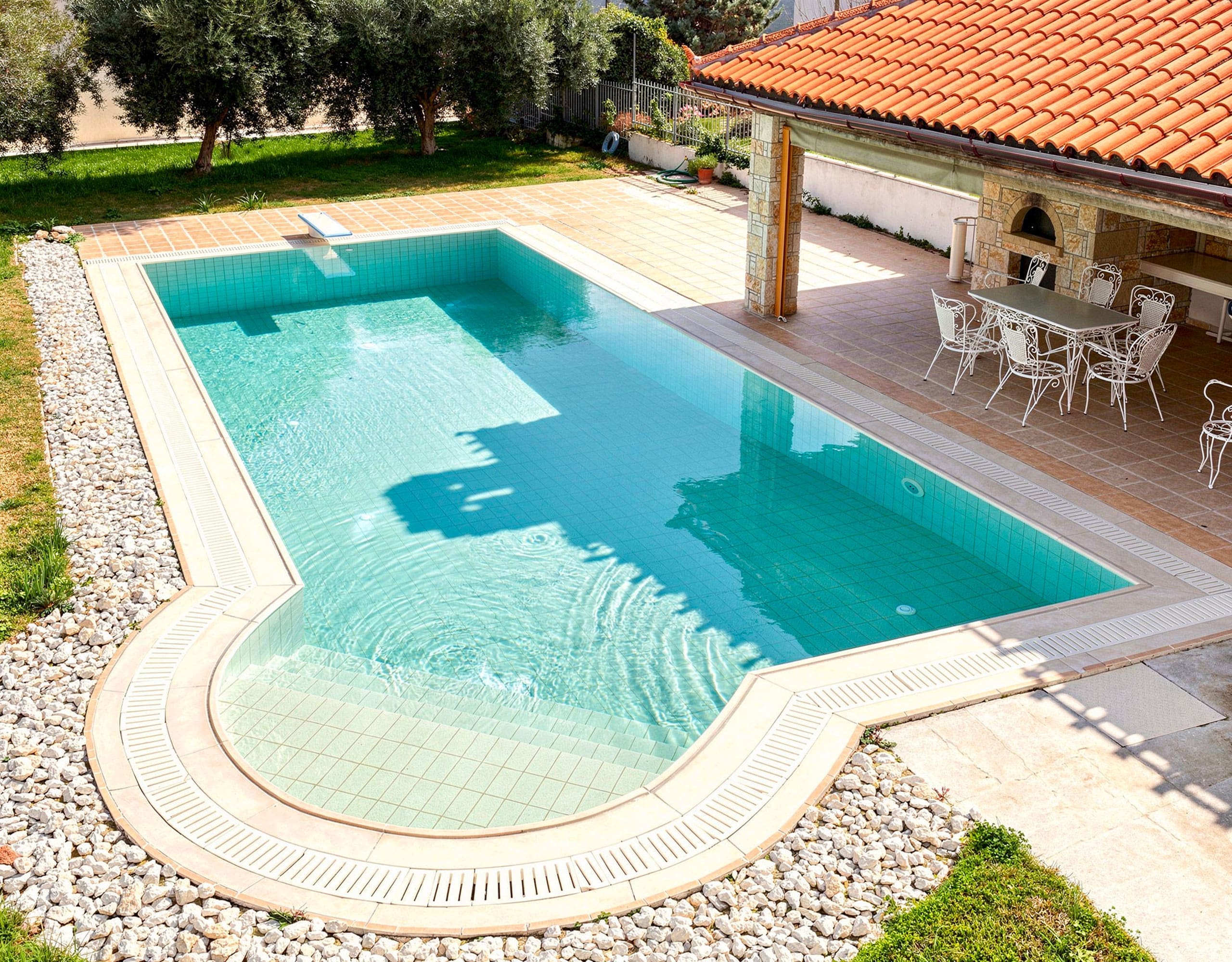 Private Pool Area — Eretria Maisonette rivate swimming pool area with pergola at the detached maisonette in Eretria