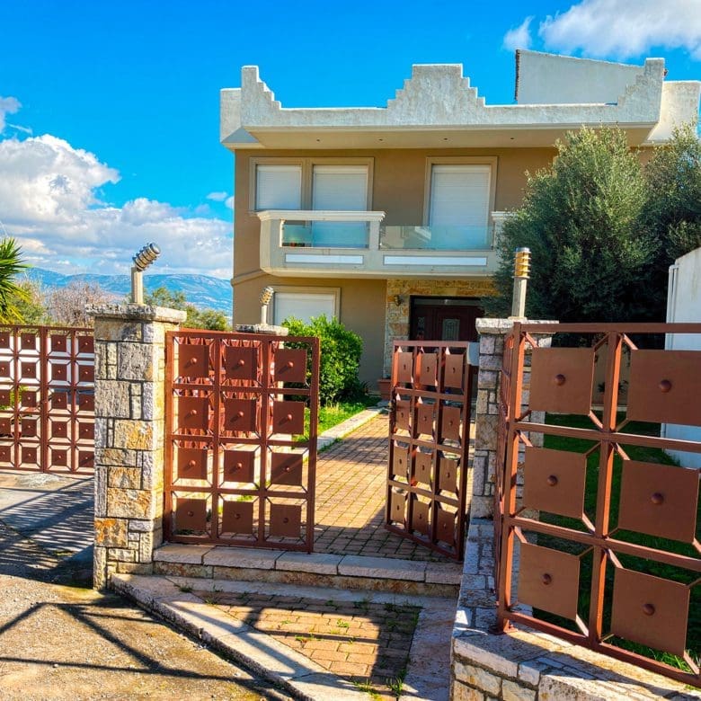 Front entrance and driveway of the detached maisonette in Eretria, Evia