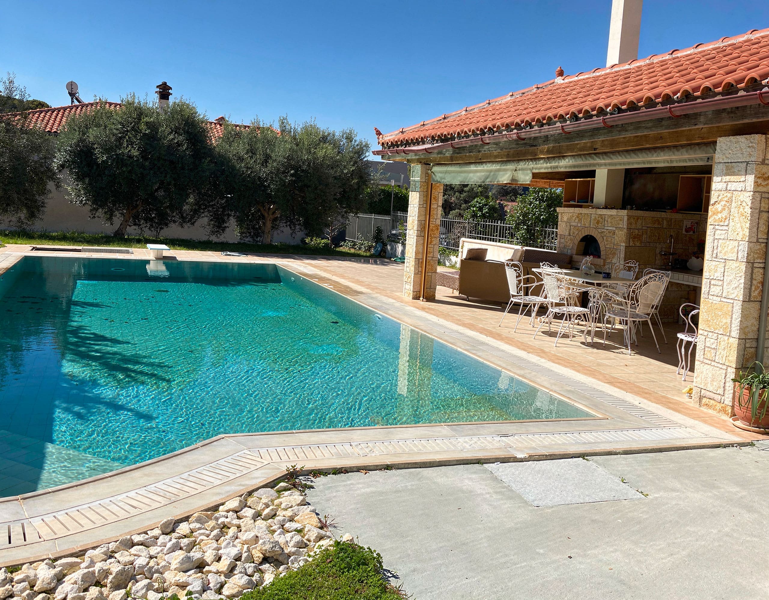 Private Pool and Covered BBQ Area — Eretria Maisonette Private pool with covered BBQ area and outdoor kitchen at the maisonette in Eretria