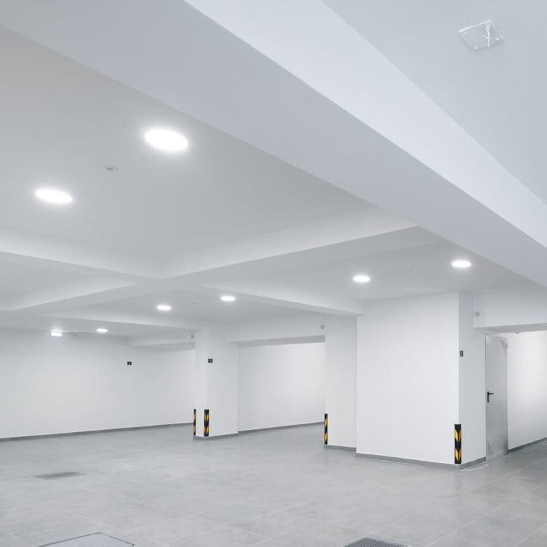 Spacious interior level with recessed lighting at Glyfada Golf Luxury Residences, Athens Riviera