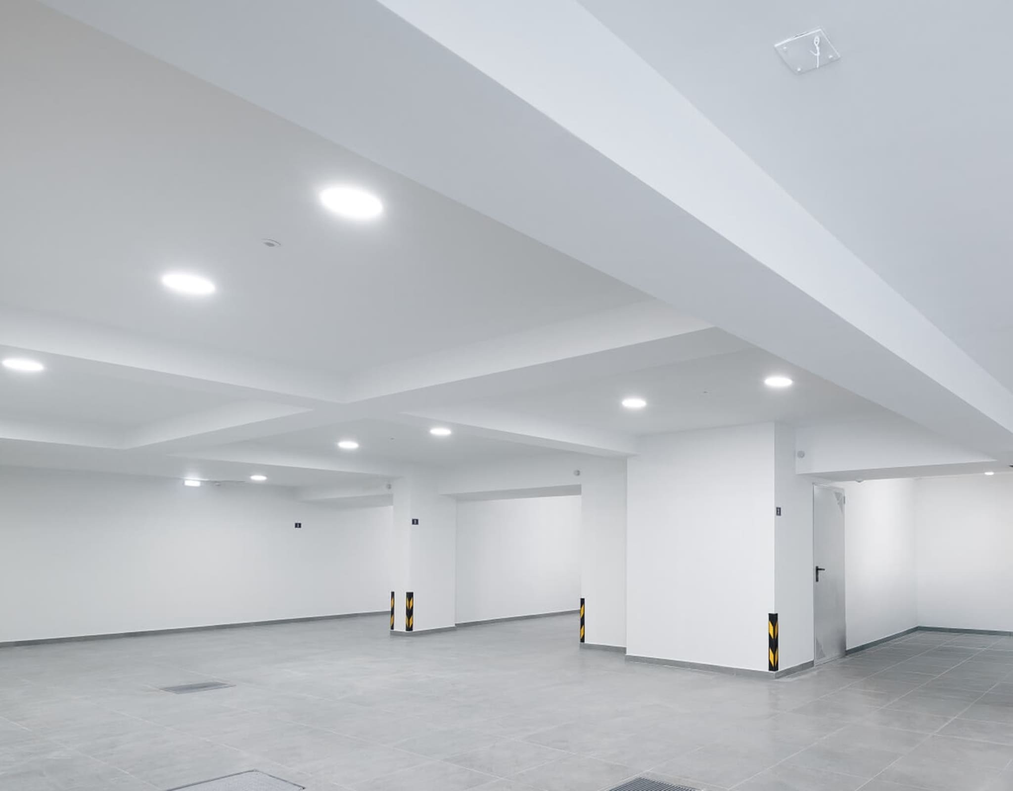 Spacious interior level with recessed lighting at Glyfada Golf Luxury Residences, Athens Riviera