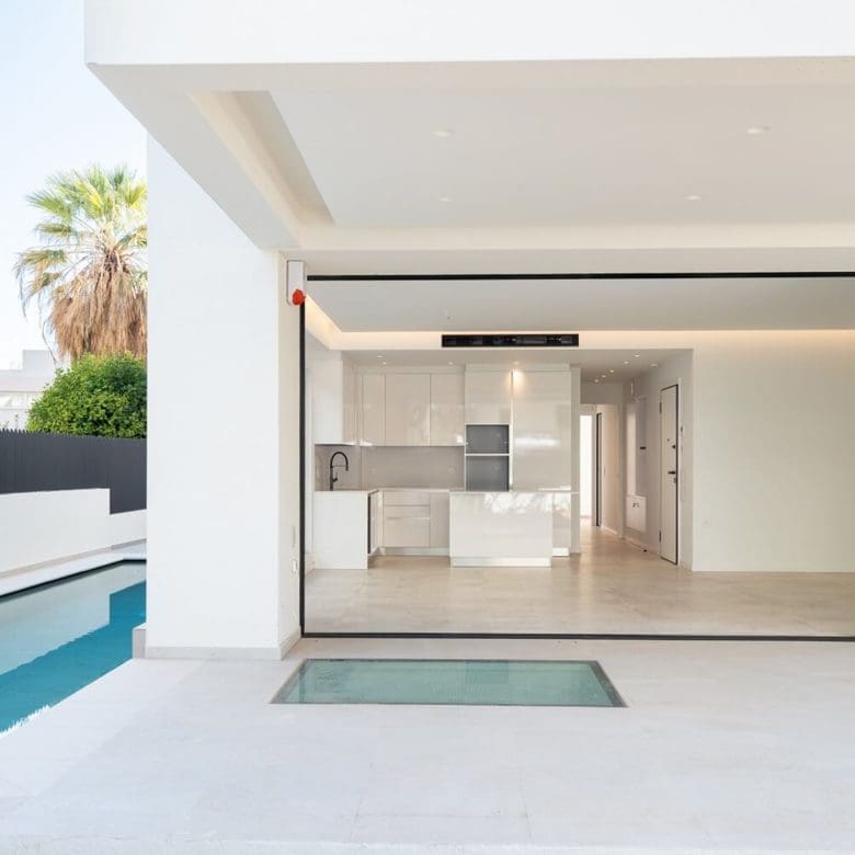 Entrance and poolside terrace at Glyfada Golf Luxury Residences, Athens Riviera