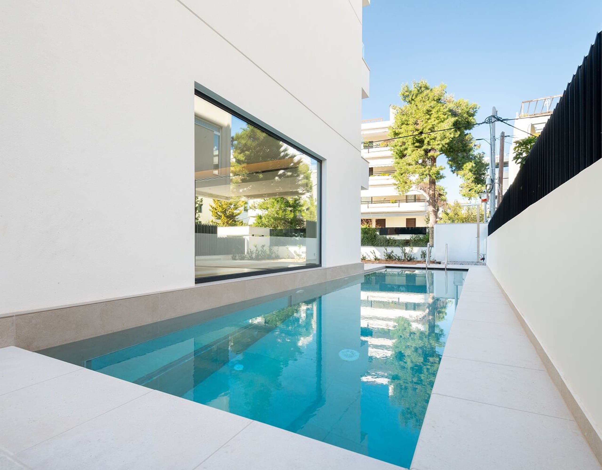 Private swimming pool corner view at Glyfada Golf Luxury Residences, Athens Riviera