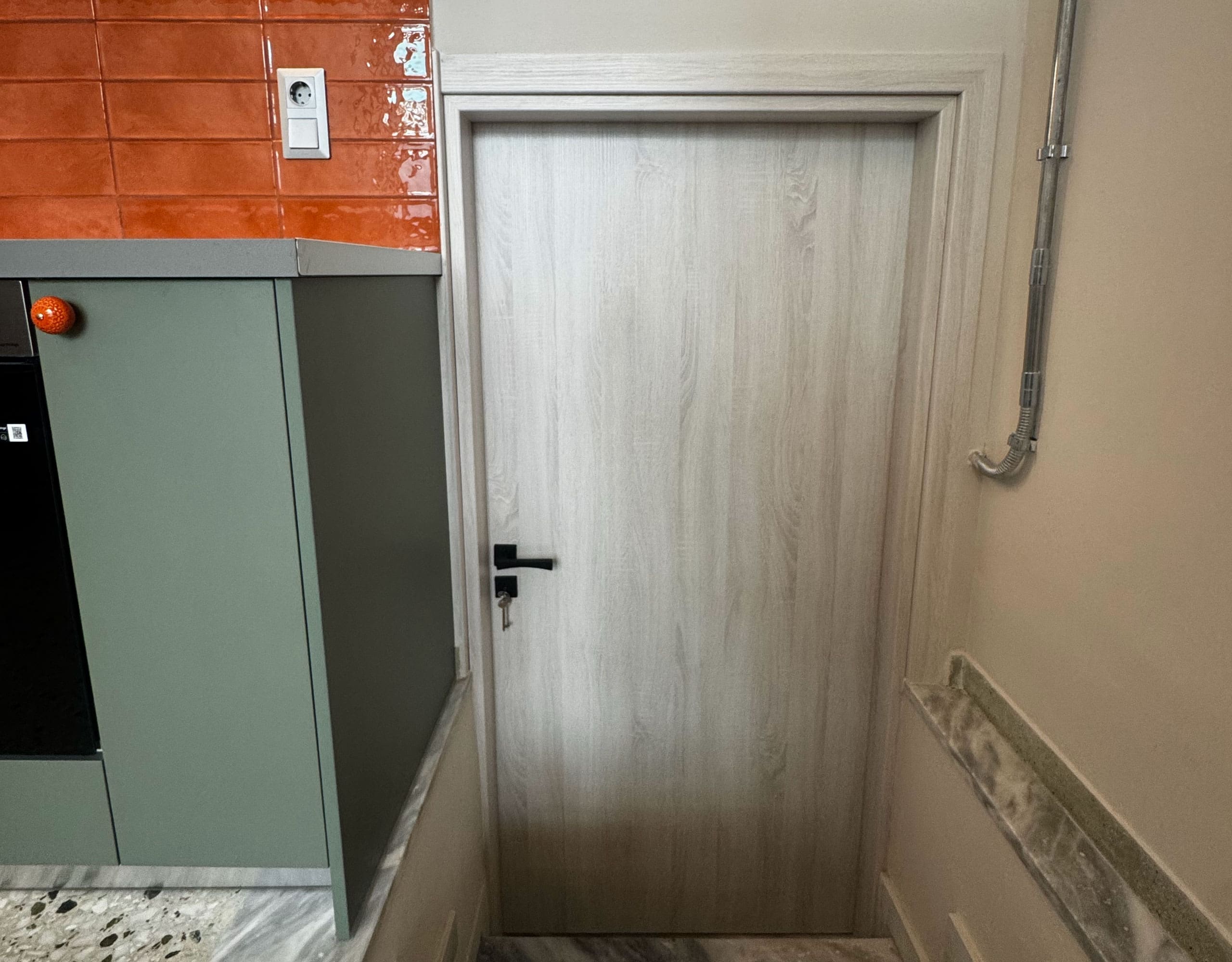 Pangrati Investment Apartment 51 sqm – Interior Door And Hallway Interior door and hallway detail next to the kitchen area, Pangrati, Athens, Greece
