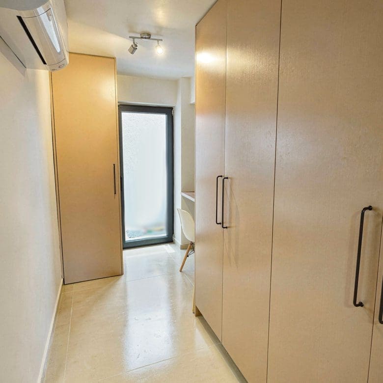 Hallway with built-in wardrobes and clean modern finishes, Pangrati, Athens, Greece