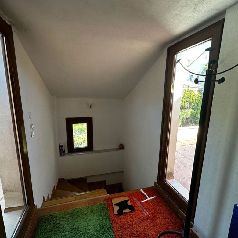 Entry area with door, window, and small landing space, Thrakomakedones, Athens, Greece