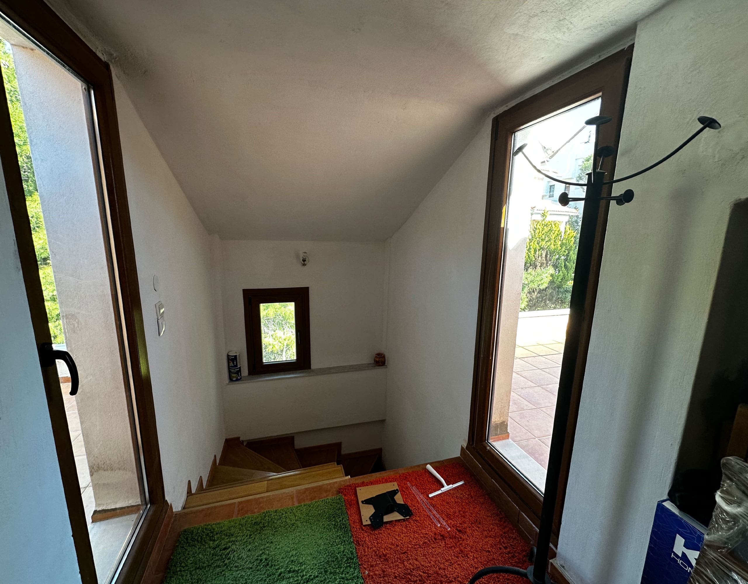 Entry area with door, window, and small landing space, Thrakomakedones, Athens, Greece