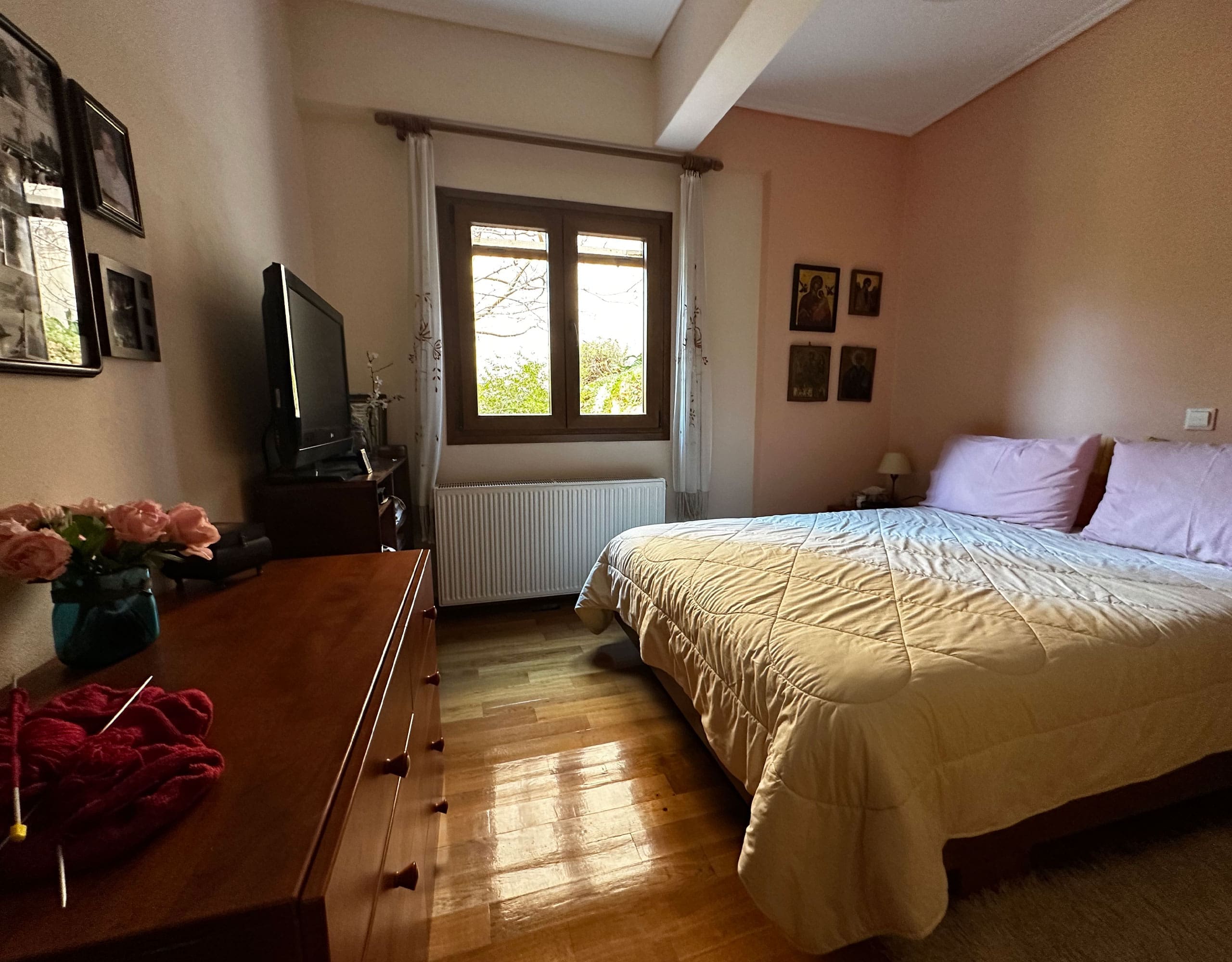 Bedroom with double bed, window, and warm wood flooring, Thrakomakedones, Athens, Greece