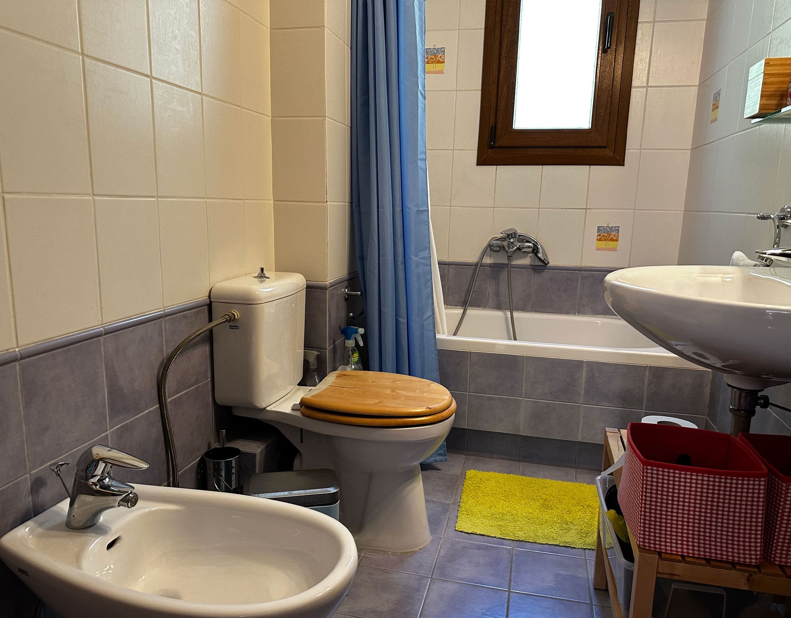 Bathroom with bathtub, sink, and tiled walls, Thrakomakedones, Athens, Greece