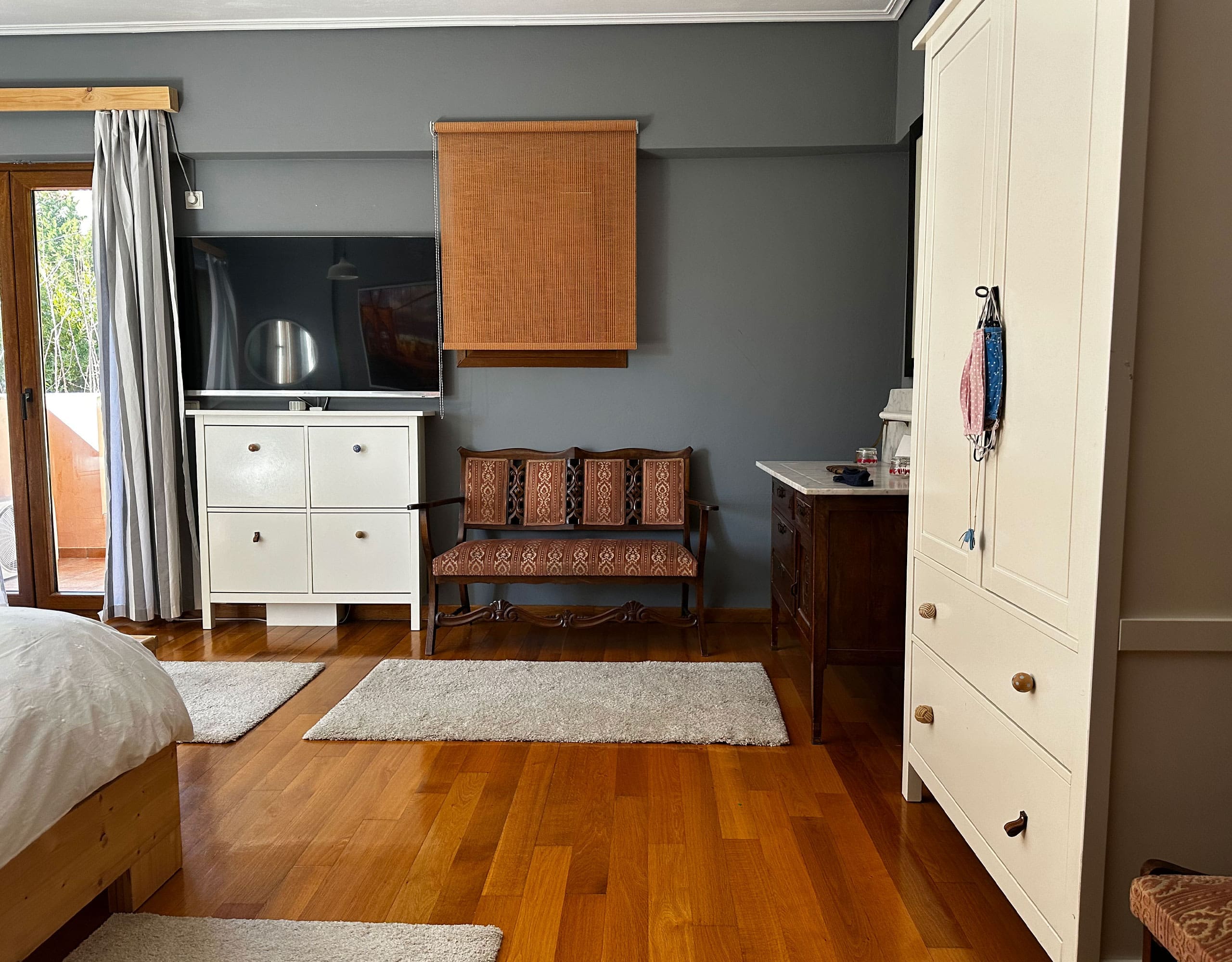 Bedroom with wardrobe, dresser, and warm wood flooring, Thrakomakedones, Athens, Greece