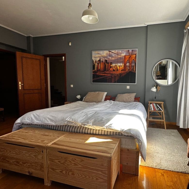 Bedroom with double bed, grey walls, and framed artwork, Thrakomakedones, Athens, Greece