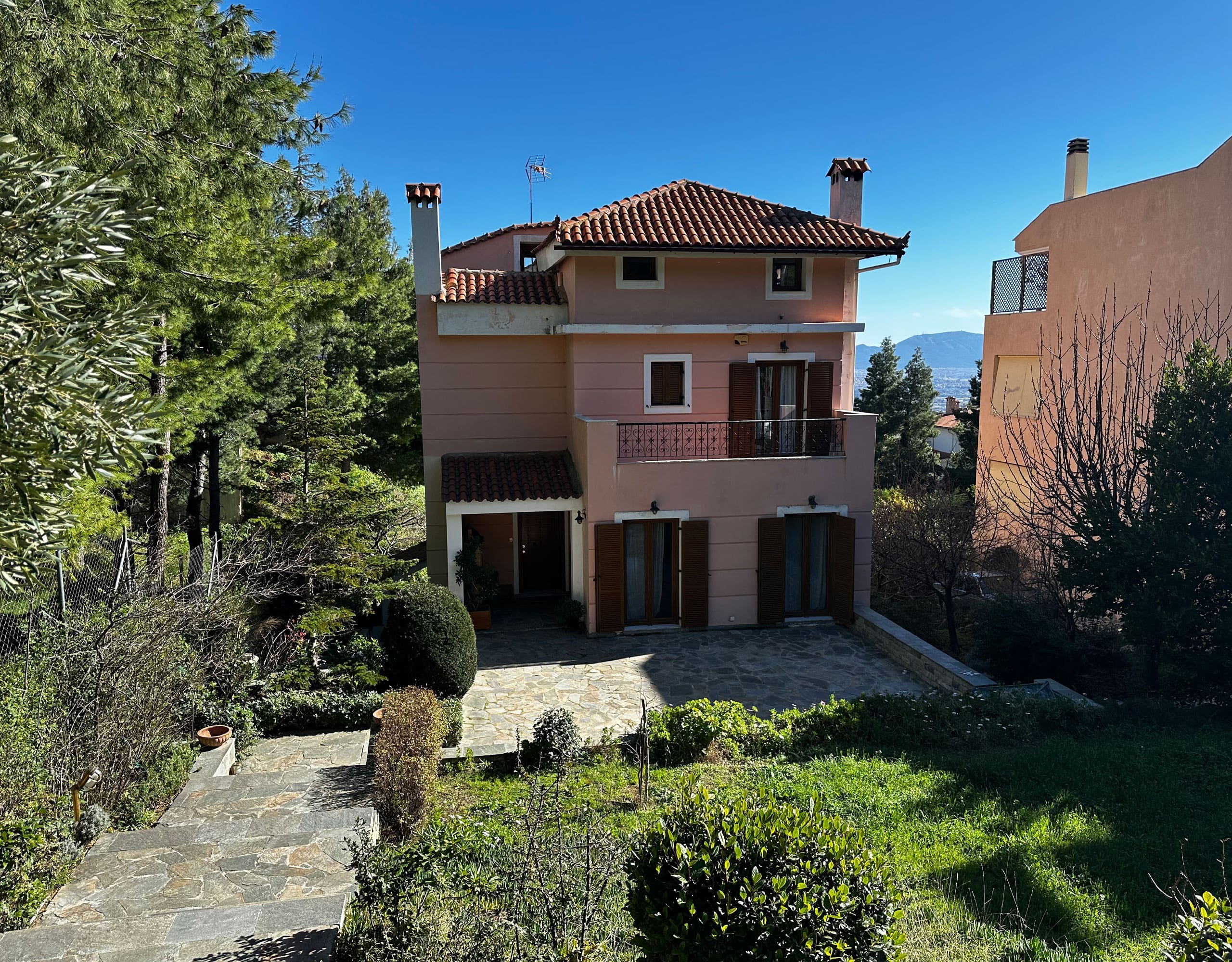 Detached house exterior in Thrakomakedones, Athens with garden and mountain views