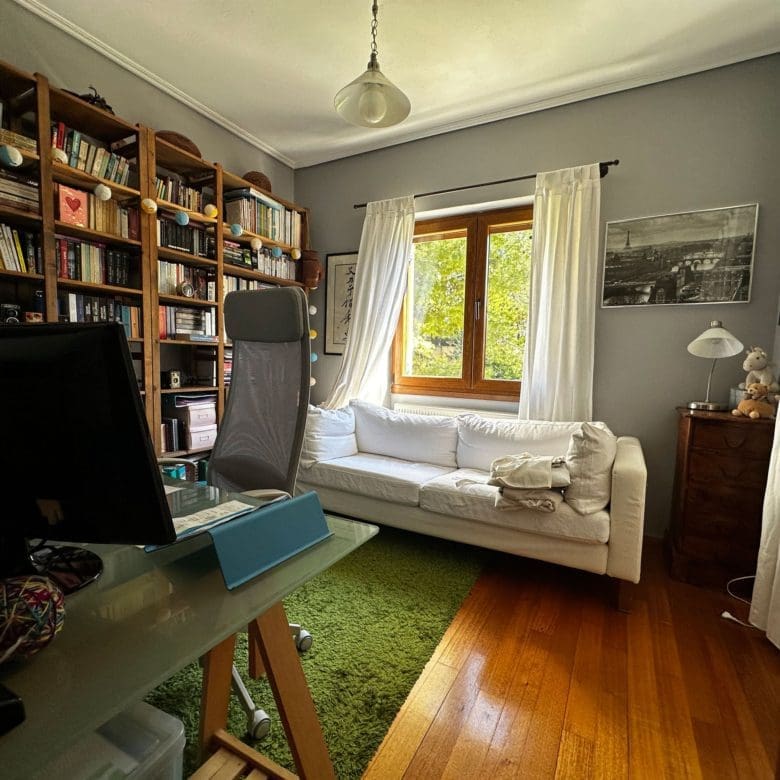 Room with built-in bookcase, desk area, and natural light, Thrakomakedones, Athens, Greece