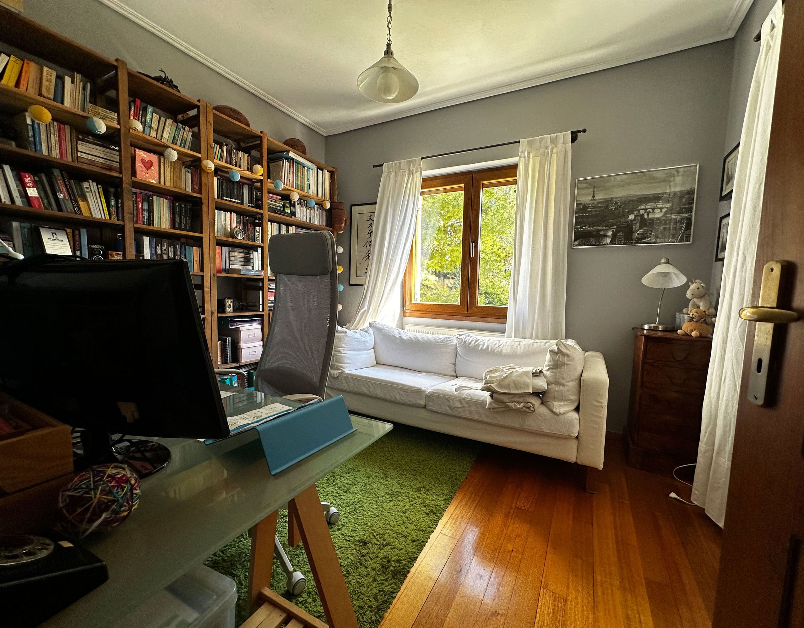 Room with built-in bookcase, desk area, and natural light, Thrakomakedones, Athens, Greece