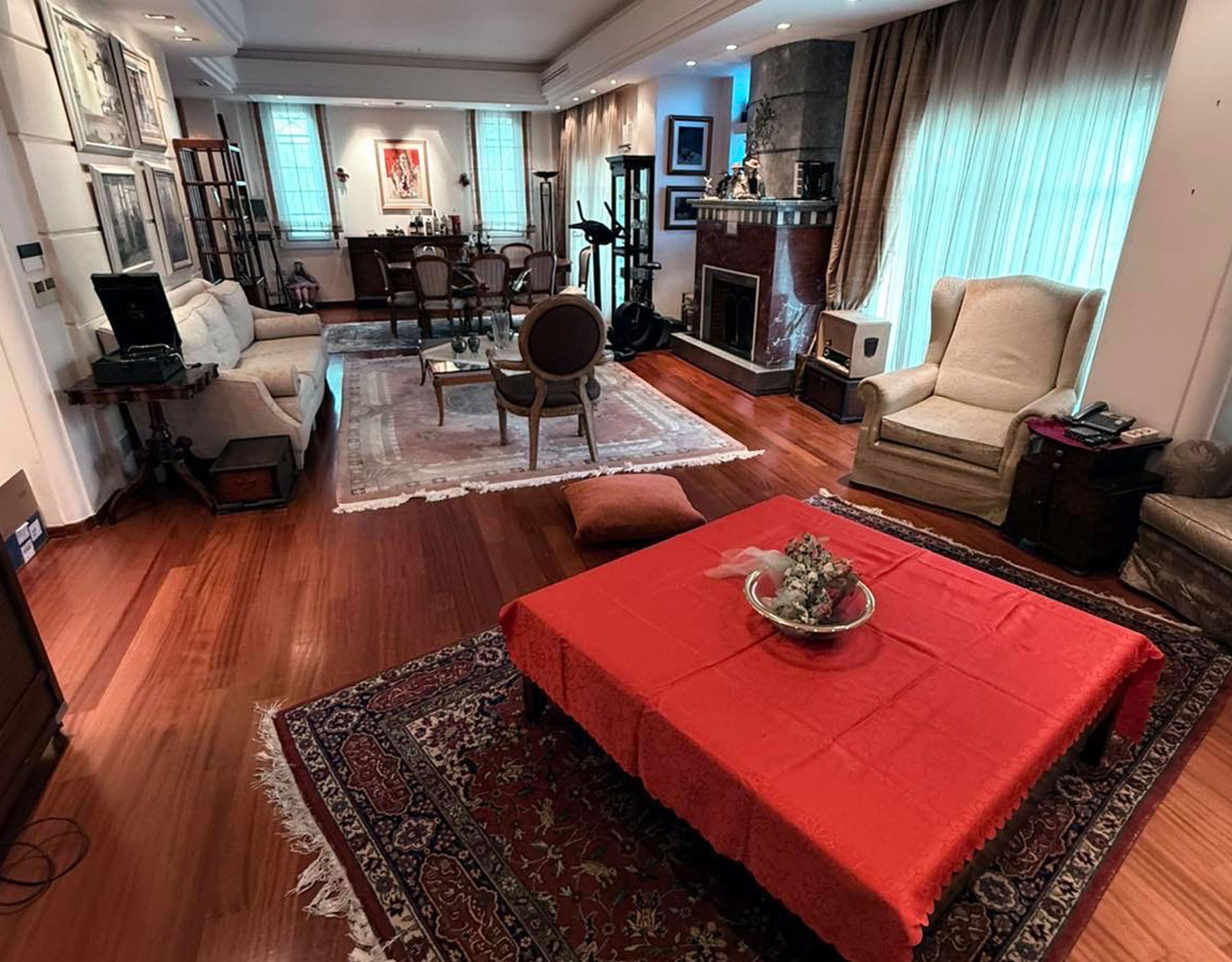 Living room with wood flooring, seating area, and coffee table, Oreokastro, Thessaloniki, Greece