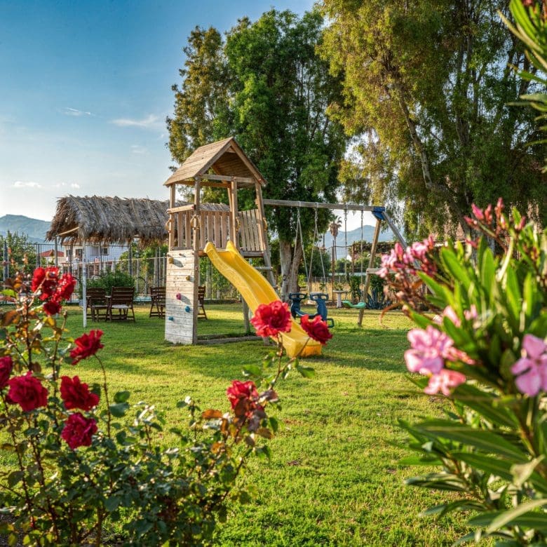 Landscaped garden with flowers and children’s playground, Skala Kallonis, Lesvos, Greece
