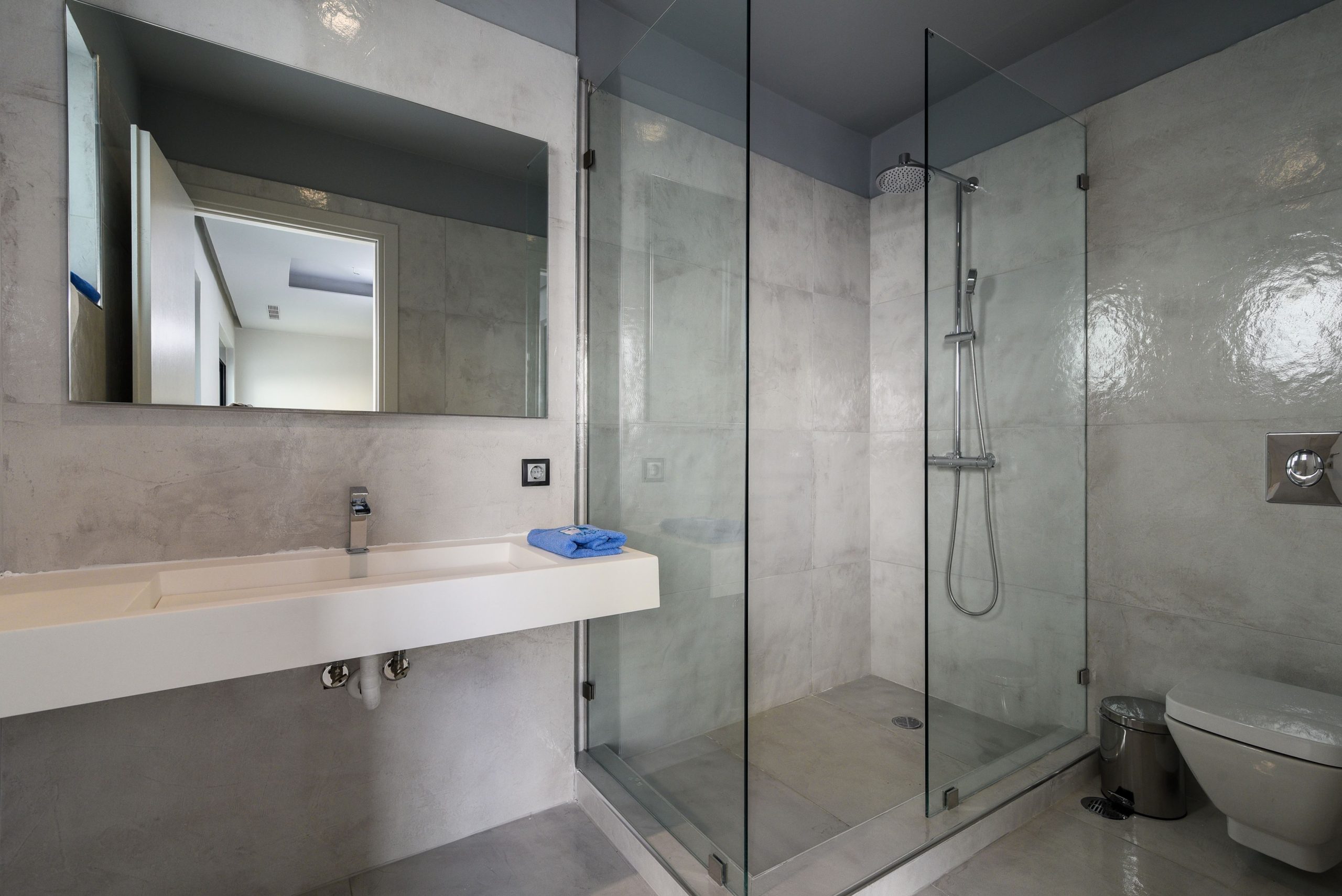 Sounio Beachfront Twin Villas – Bathroom Vanity And Shower Detail Bathroom detail with vanity, mirror, and glass shower enclosure, Sounio, Athens Riviera, Greece