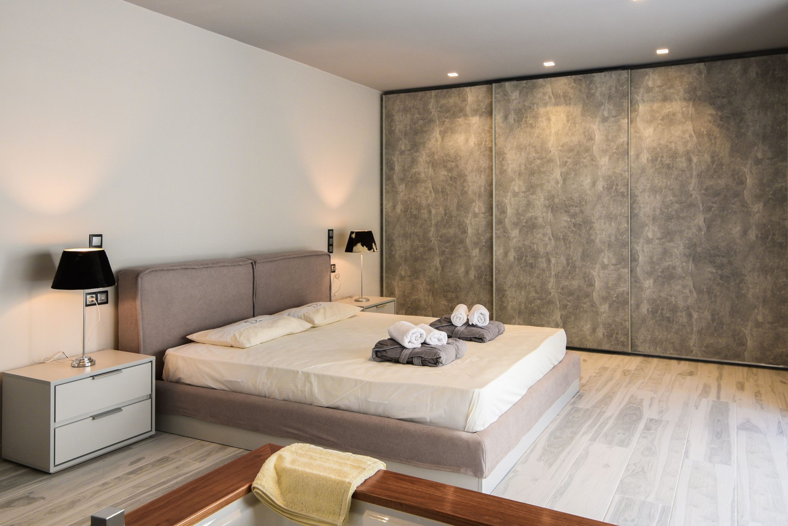 Sounio Beachfront Twin Villas – Bedroom With Accent Wall Bedroom with double bed, neutral decor, and textured accent wall, Sounio, Athens Riviera, Greece