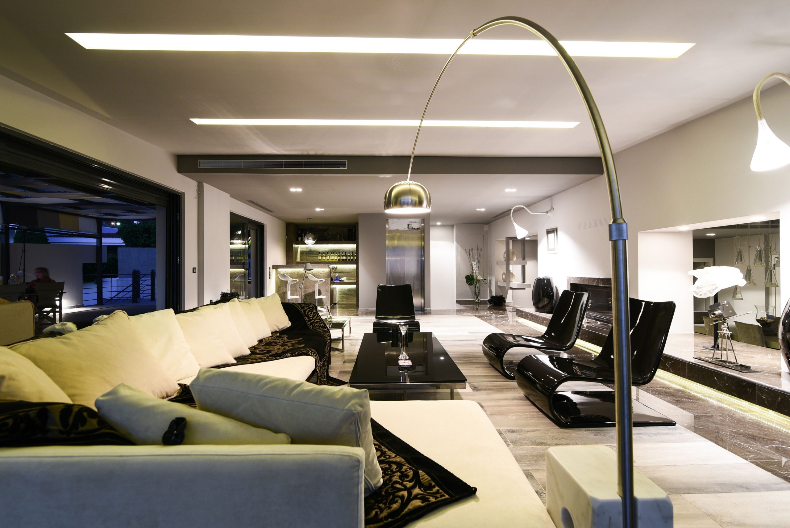 Sounio Beachfront Twin Villas – Open-Plan Living Room Open-plan living room with modern seating and feature ceiling lighting, Sounio, Athens Riviera, Greece