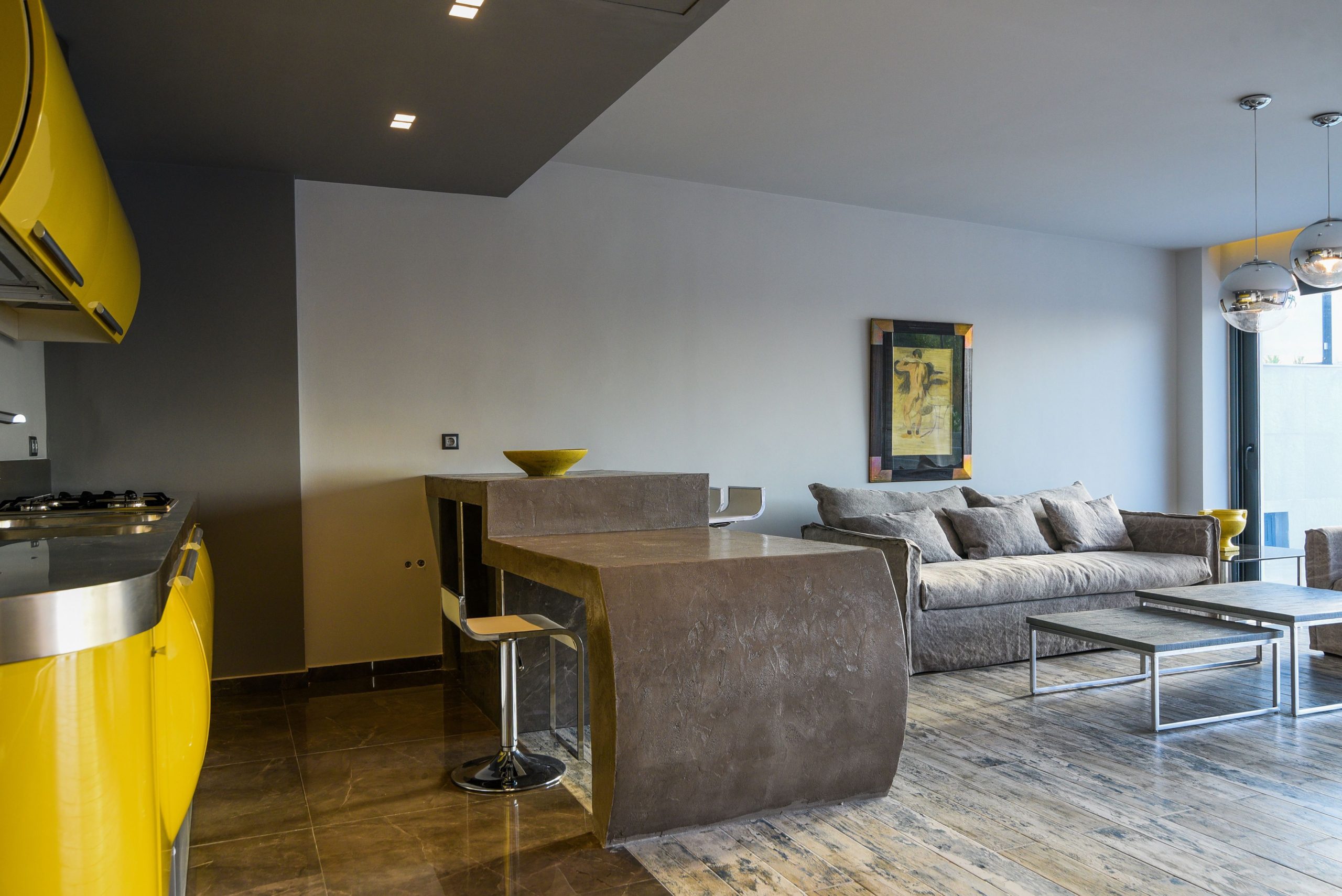 Sounio Beachfront Twin Villas – Open-Plan Living And Kitchen Open-plan living room and kitchen with island seating and modern finishes, Sounio, Athens Riviera, Greece