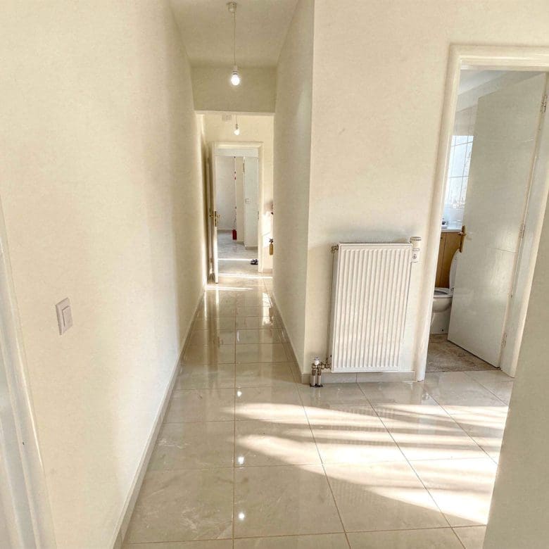 Interior hallway with doorway and natural light, Vasiliko, Evia, Greece