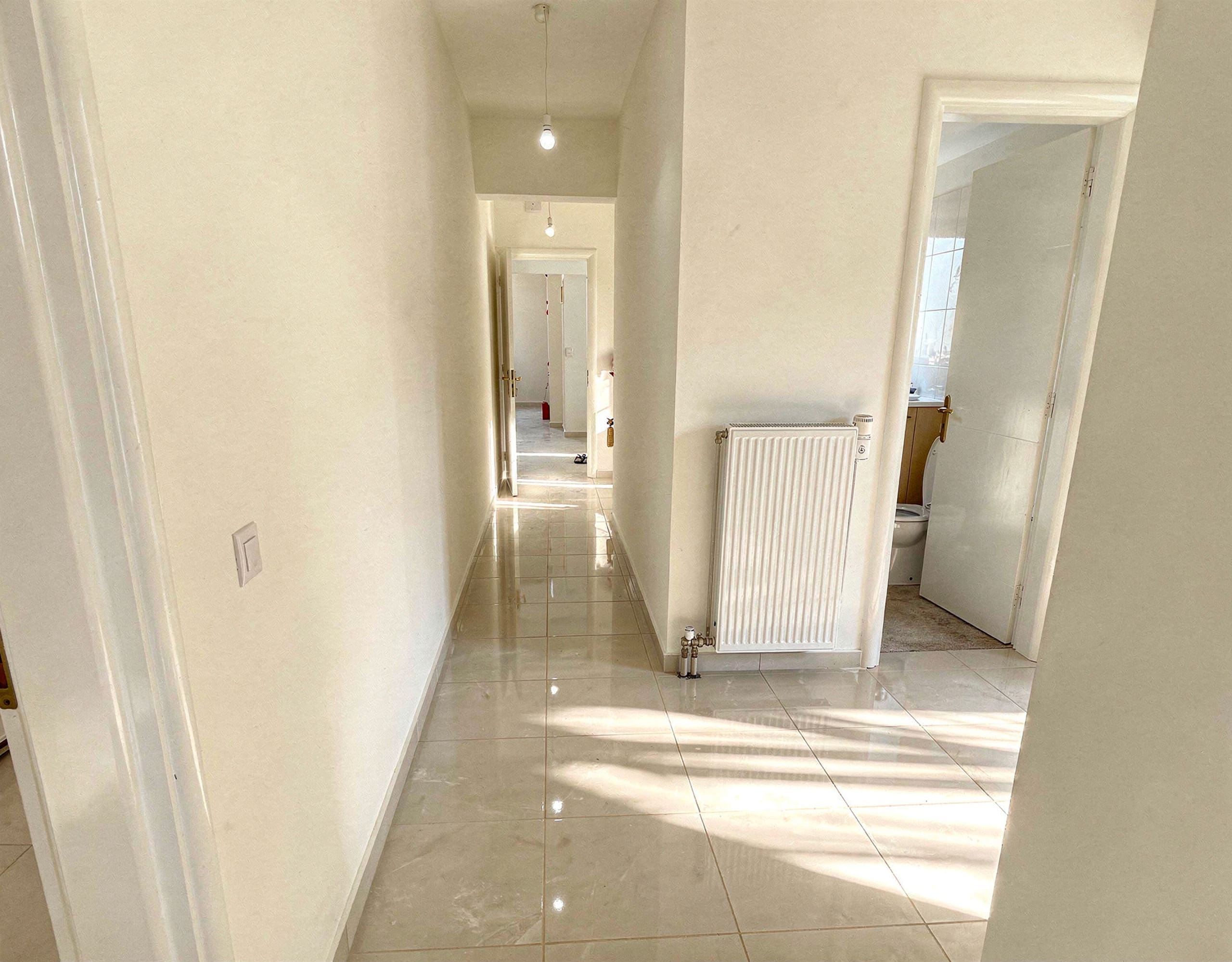 Interior hallway with doorway and natural light, Vasiliko, Evia, Greece