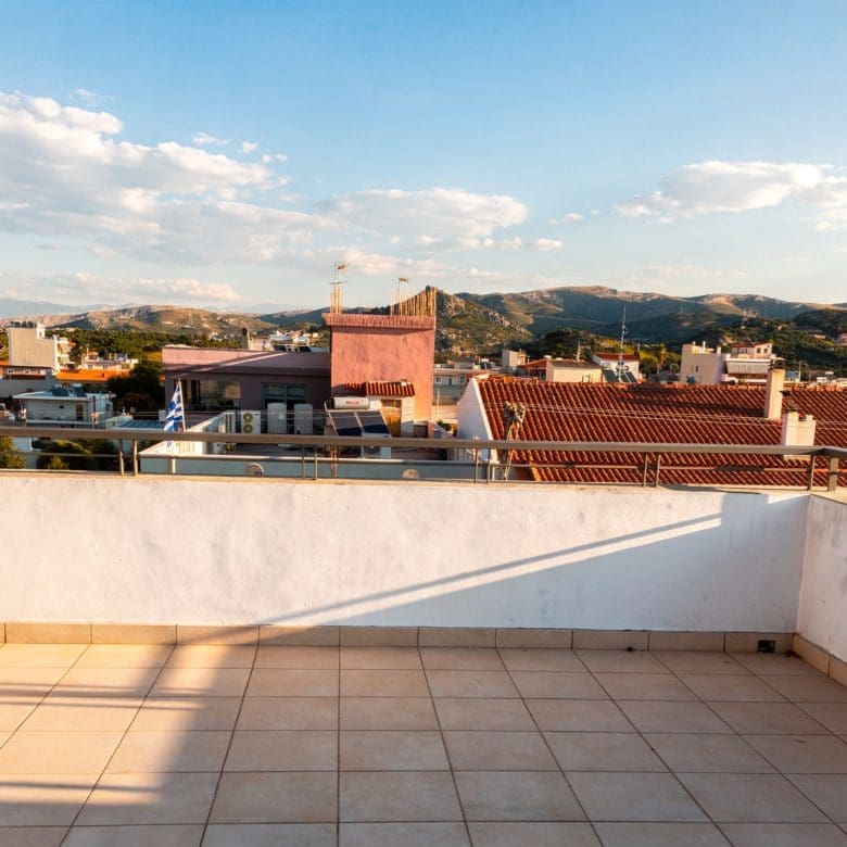 Terrace view over rooftops and the surrounding area in daylight, Vasiliko, Evia, Greece