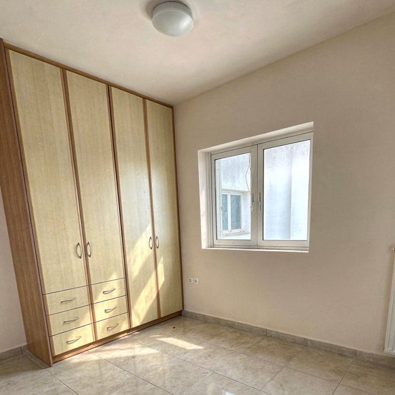 Bedroom with built-in wardrobes and tiled floor, Vasiliko, Evia, Greece