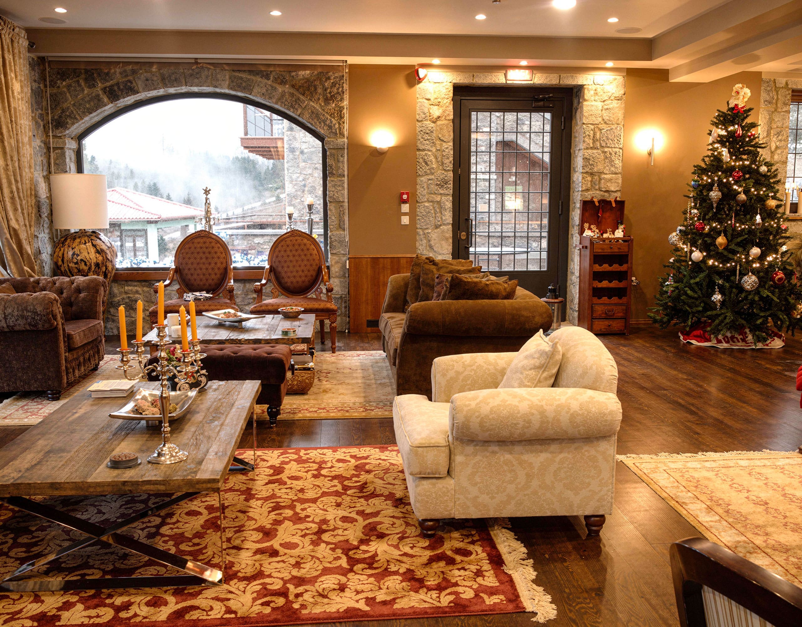Hotel lounge with classic seating, warm lighting, and festive decor, Kardaras, Mount Mainalo, Arcadia, Greece