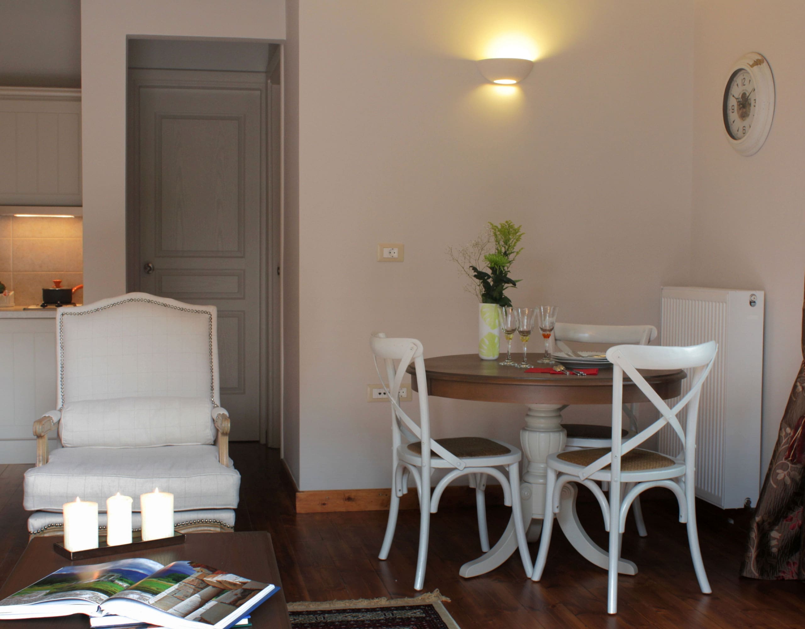 Suite interior with bed area, dining table, and kitchenette in an open-plan layout, Kardaras, Mount Mainalo, Arcadia, Greece