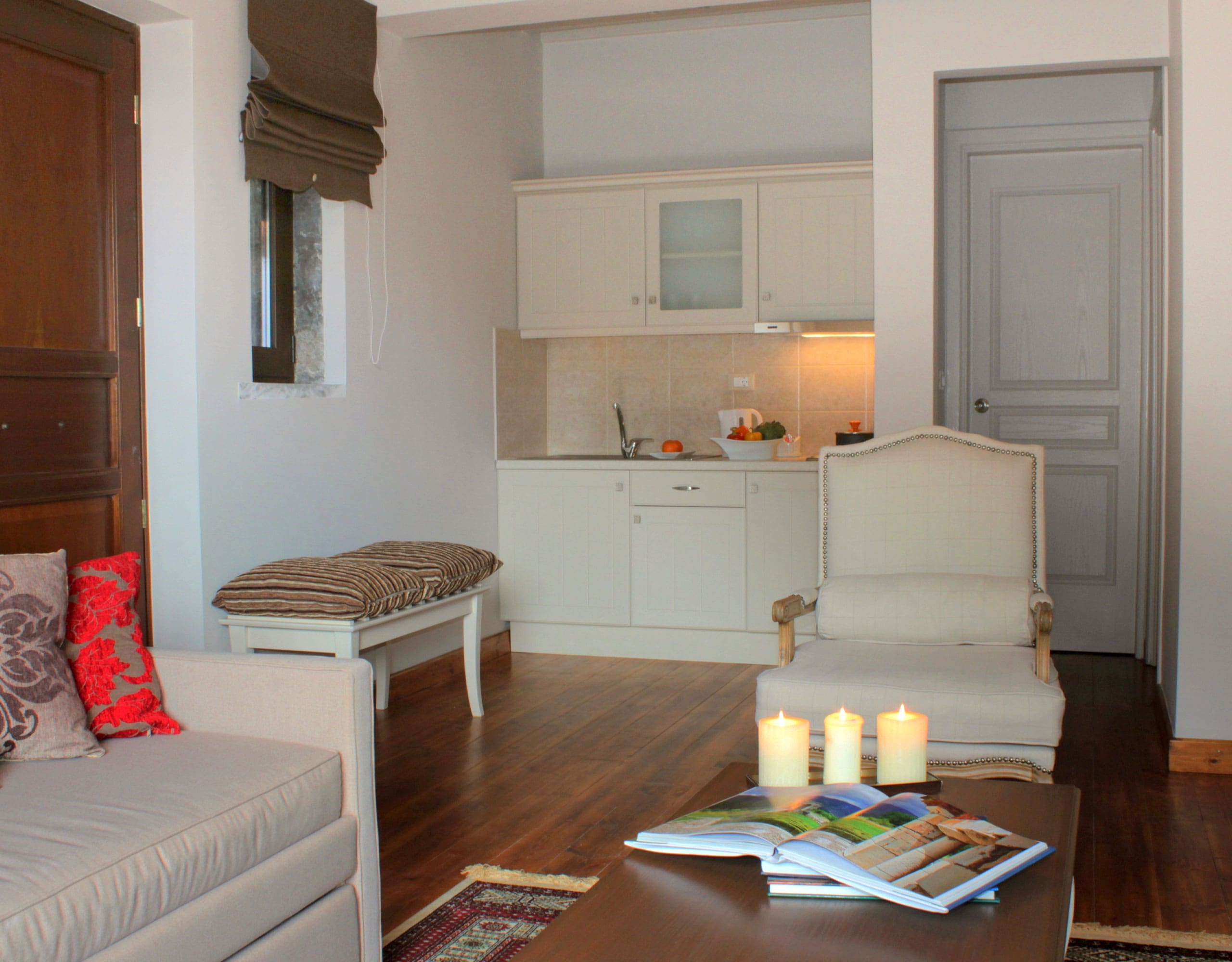 Suite living area with sofa seating, dining table, and compact kitchenette, Kardaras, Mount Mainalo, Arcadia, Greece
